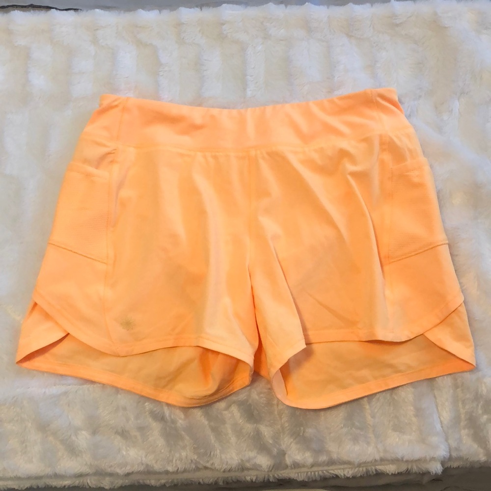 Athleta girl orange shorts size 14